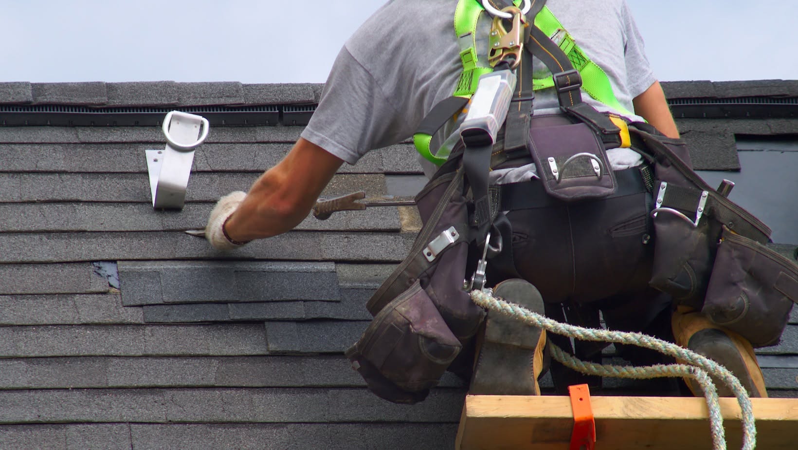 Roofing team working on a residential roof